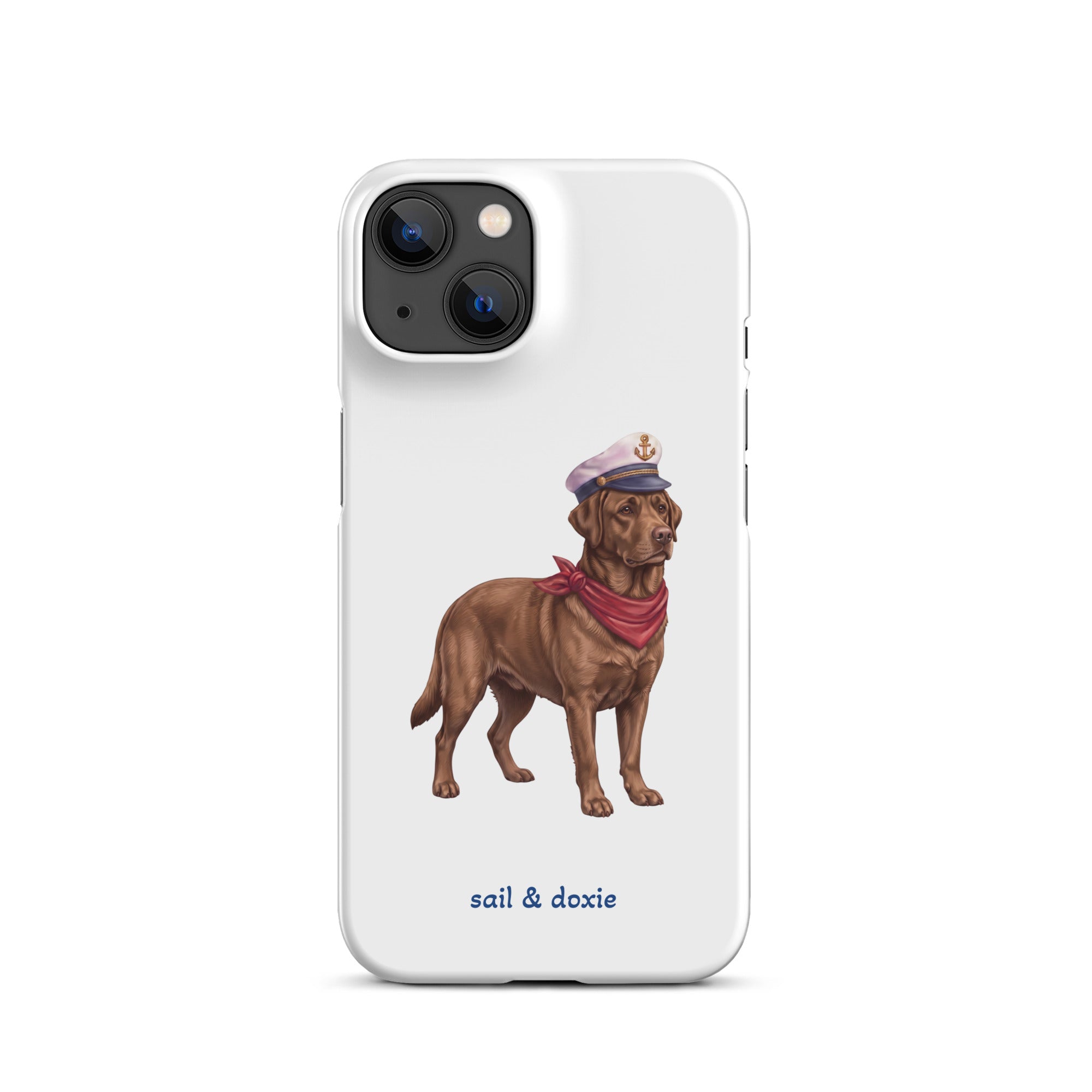 A white phone case featuring an illustration of a brown Labrador dressed as a sailor with a captain's hat and red neck scarf, with the text 'sail & doxie' printed below.
