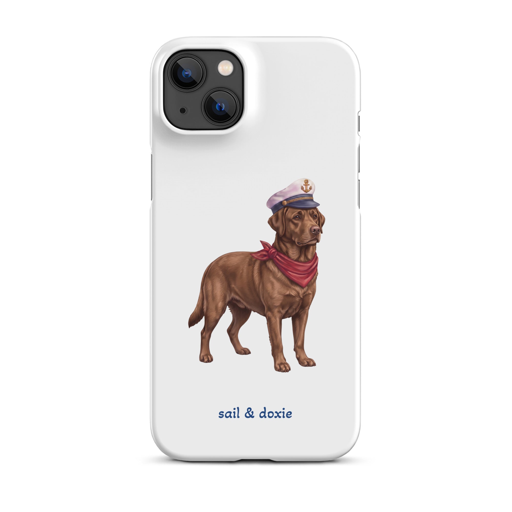 A white phone case featuring an illustration of a brown Labrador dressed as a sailor with a captain's hat and red neck scarf, with the text 'sail & doxie' printed below.