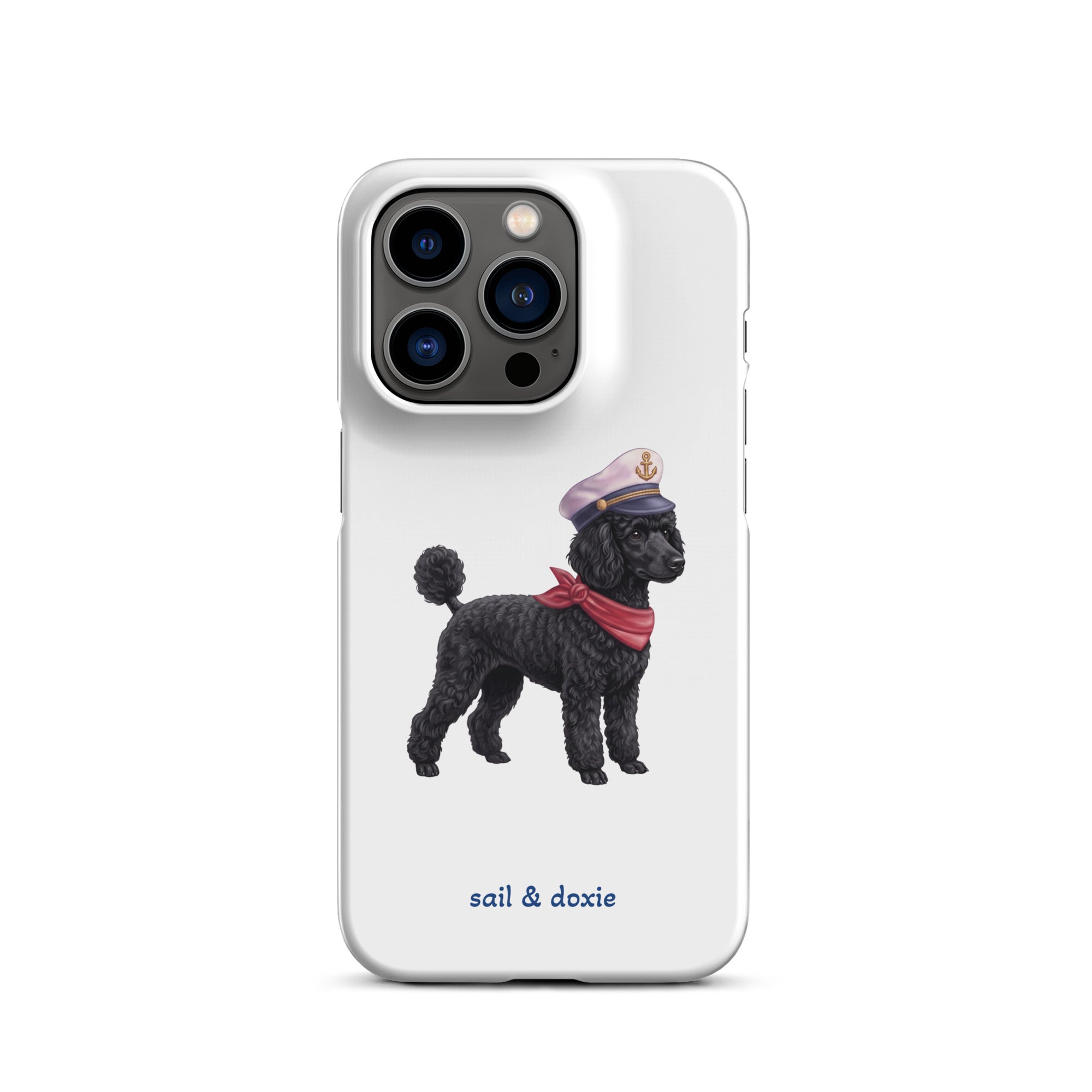A white phone case featuring a printed illustration of a black poodle wearing a navy captain's hat and red scarf, with the text 'sail & doxie' printed below in blue. The case is shown on a clean white background.