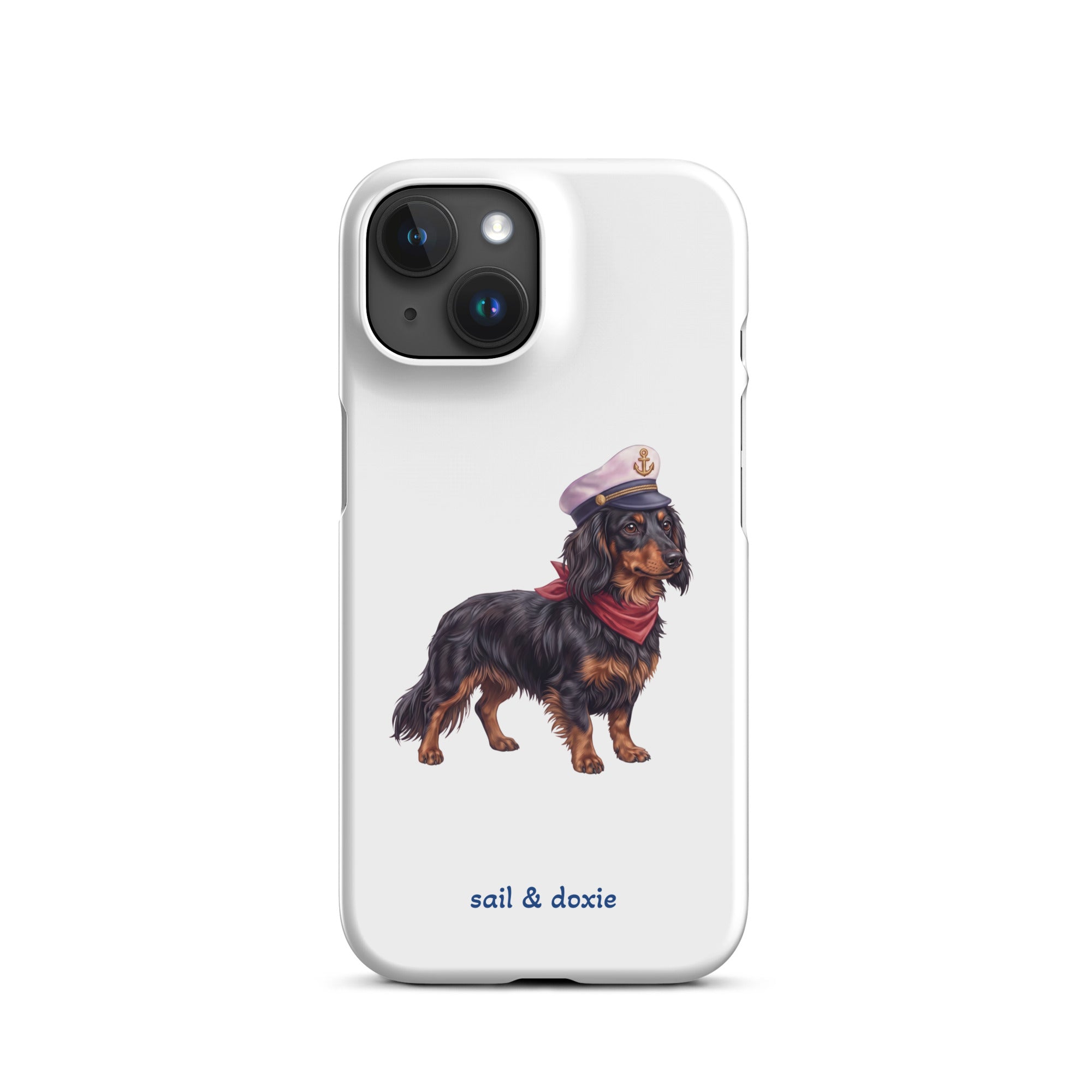 A white phone case featuring an illustration of a black and tan dachshund wearing a captain's hat and red neckerchief, with the text 'sail & doxie' printed below in blue. The case is shown on a clean white background.