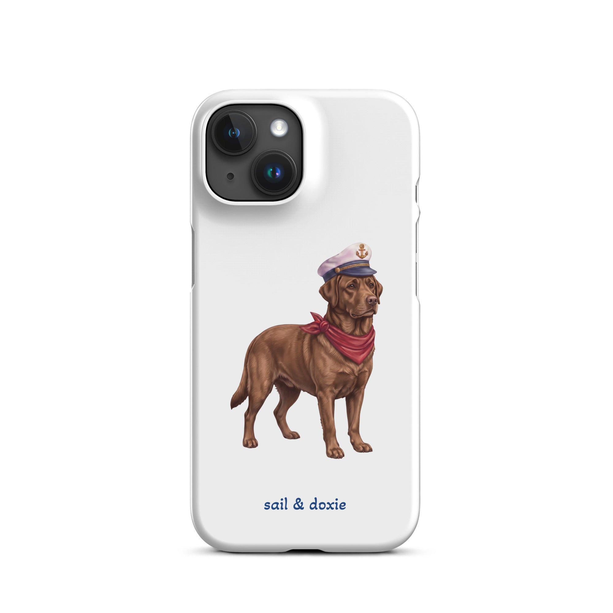 A white phone case featuring an illustration of a brown Labrador dressed as a sailor with a captain's hat and red neck scarf, with the text 'sail & doxie' printed below.