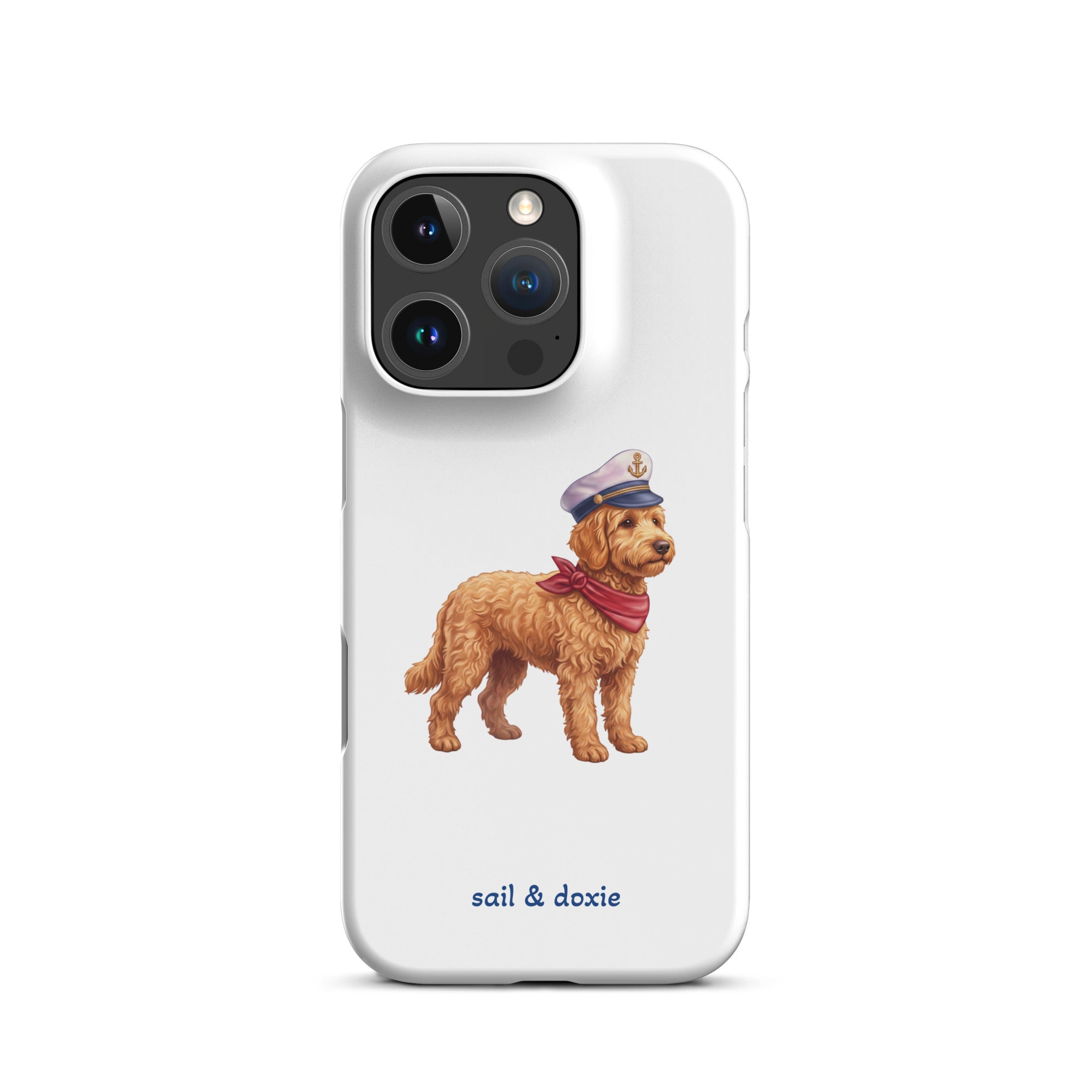 A white phone case featuring a printed illustration of a doodle dog wearing a captain's hat and red neck scarf, with the text 'sail & doxie' printed below in blue. The case is shown on a clean white background.