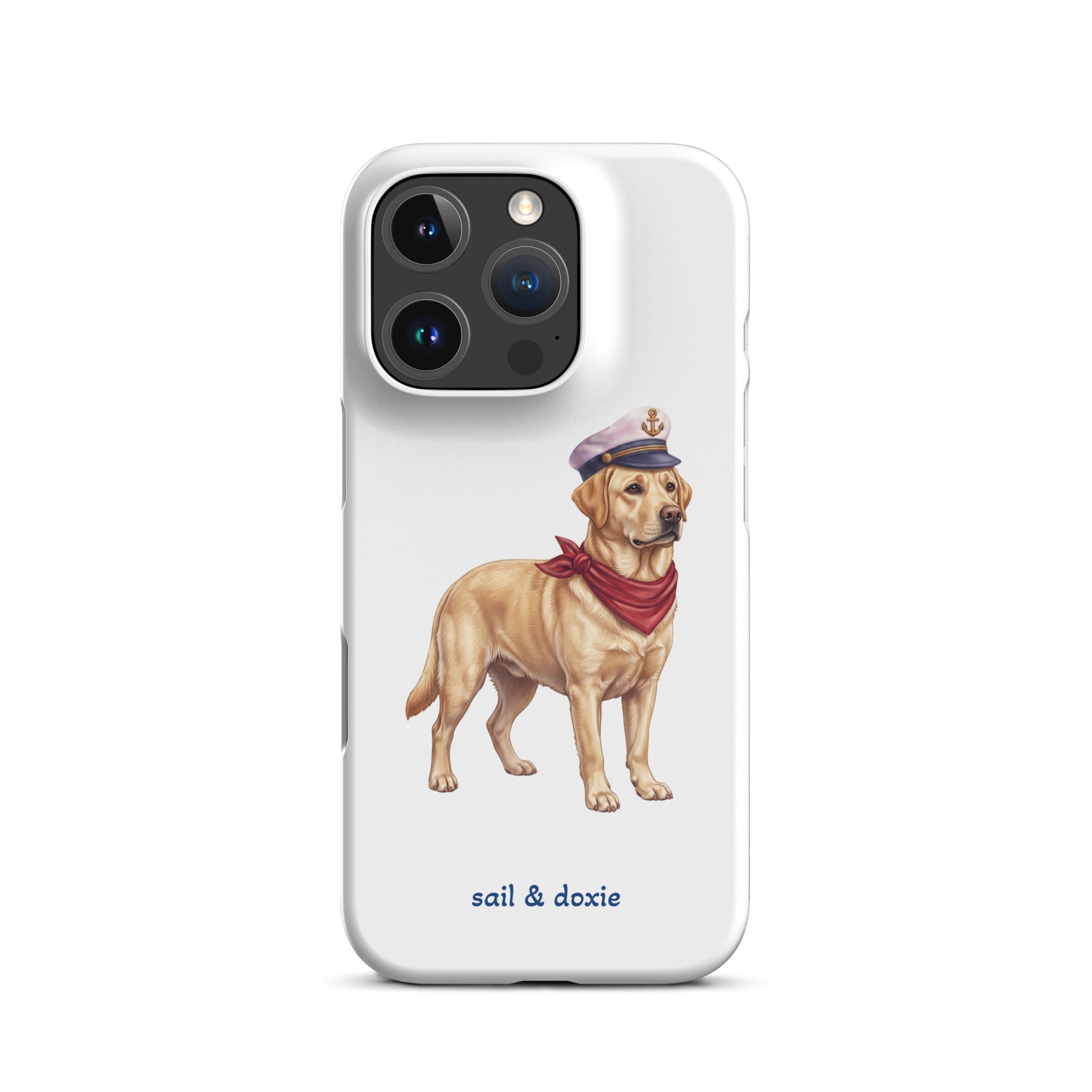 A white phone case featuring an illustration of a yellow Labrador dressed as a sailor with a captain's hat and red neck scarf, with the text 'sail & doxie' printed below.