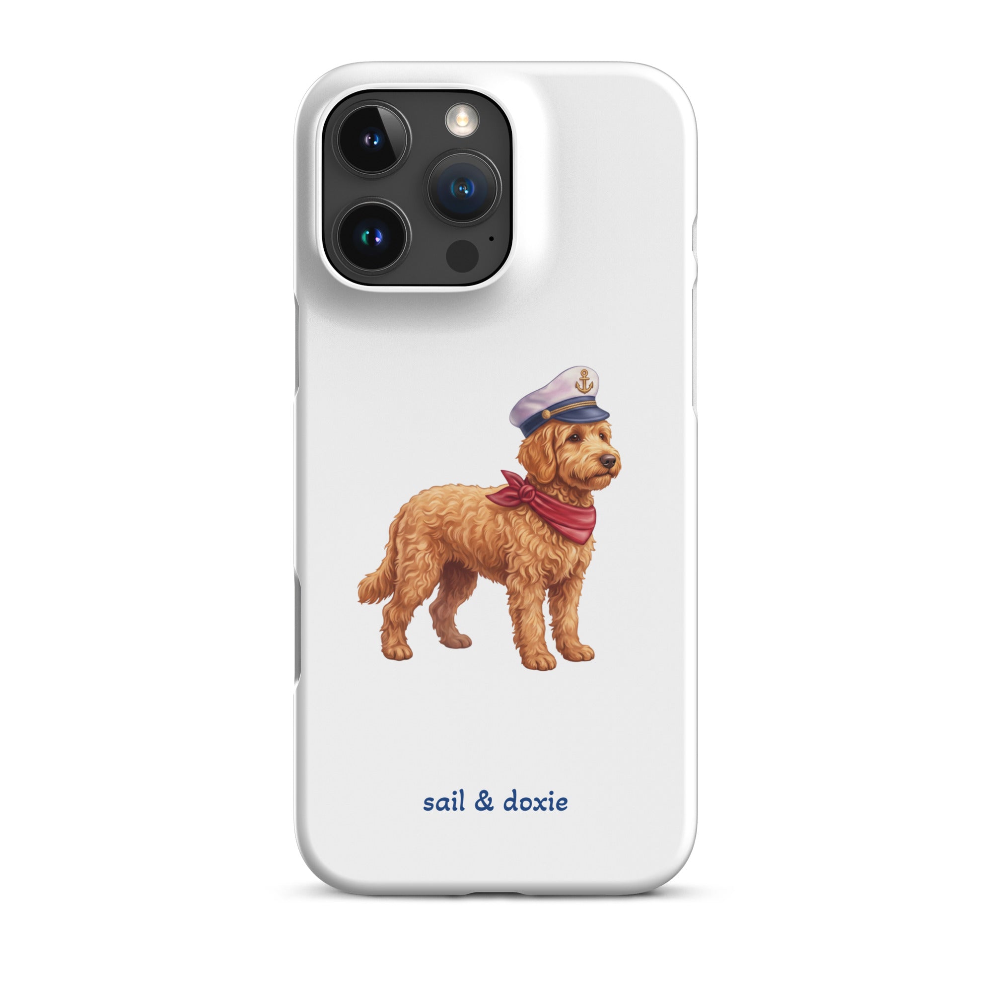 A white phone case featuring a printed illustration of a doodle dog wearing a captain's hat and red neck scarf, with the text 'sail & doxie' printed below in blue. The case is shown on a clean white background.