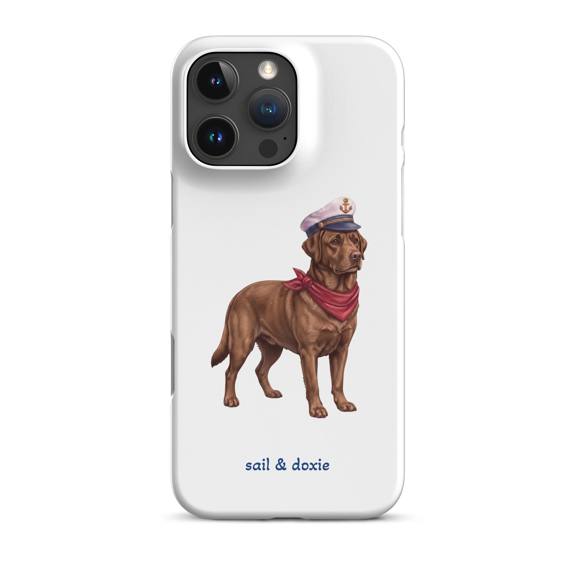 A white phone case featuring an illustration of a brown Labrador dressed as a sailor with a captain's hat and red neck scarf, with the text 'sail & doxie' printed below.