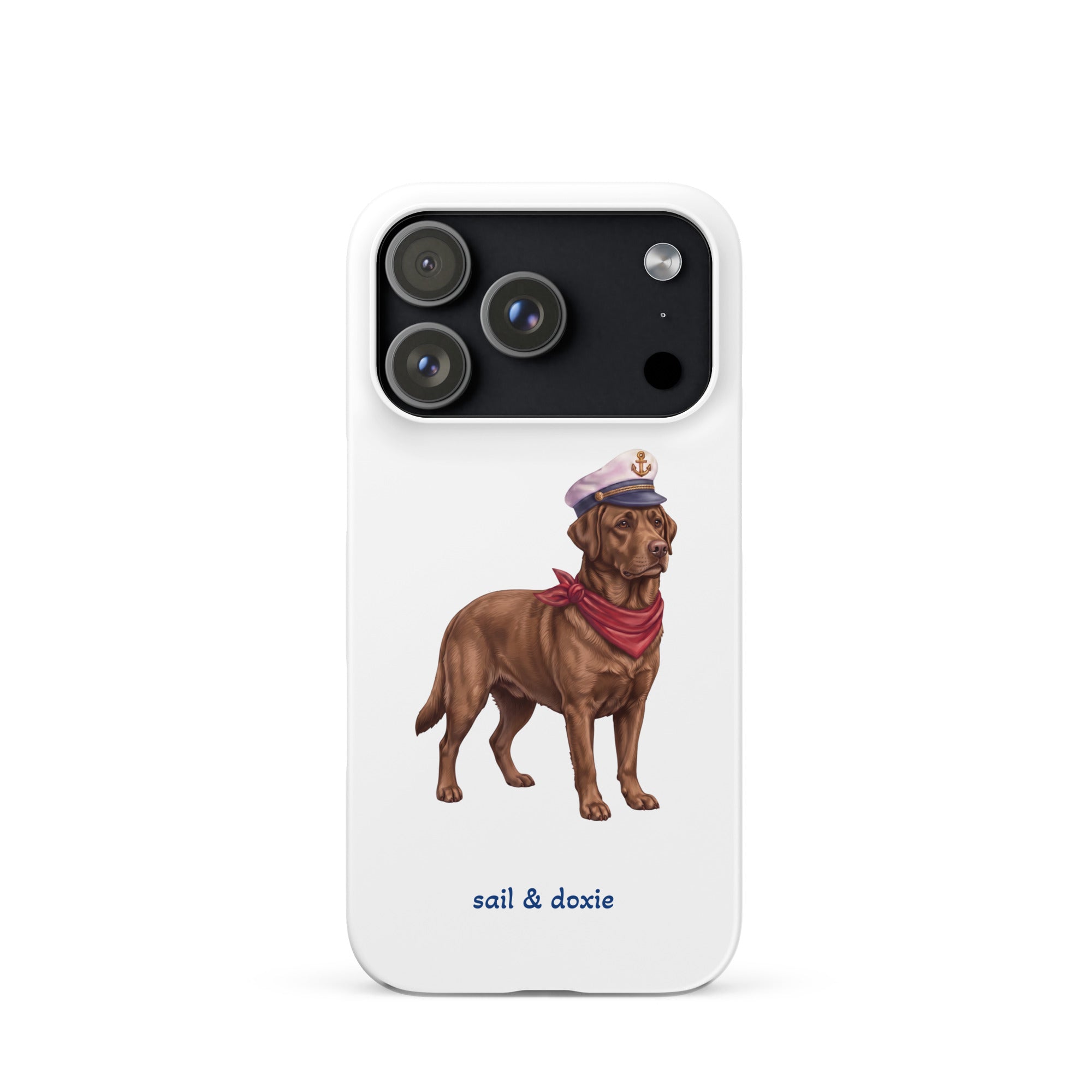 A white phone case featuring an illustration of a brown Labrador dressed as a sailor with a captain's hat and red neck scarf, with the text 'sail & doxie' printed below.